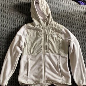 grey/white north face jacket